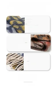 Detail of wool rich gradient leopard print scarf with soft texture and fringe edges