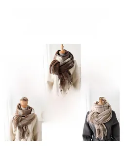 Detailed close-up of soft plaid scarves with tassels in coffee blue and camel colors