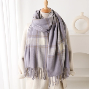 Plaid tassel scarf in purple and beige cashmere-style fabric worn with beige coat