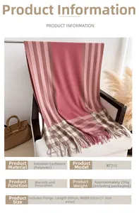 Detailed view of pink and brown plaid cashmere-like scarf with fringe and size specs