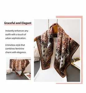 Close-up of vintage floral and paisley patterns on a silky brown and beige square scarf