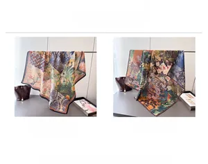 Dual-sided silk scarves in light blue floral and deep nature patterns with stylish borders