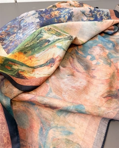 Detail of artistic herringbone pattern silk scarf with vibrant impressionist oil painting print