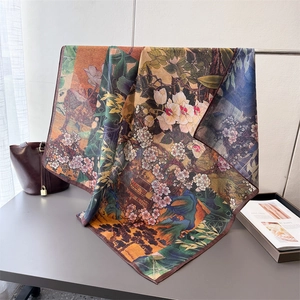 Double-sided herringbone silk scarf featuring classic oriental floral and pavilion patterns