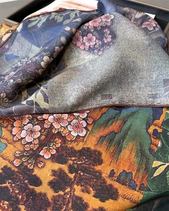 Detail of premium herringbone silk scarf with traditional Chinese landscape and plum blossom