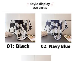 Detail of floral silk-feel scarves in black and navy blue with camellia pattern