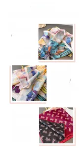 Detail of double-sided silk scarf showing floral print, herringbone weave and hand-rolled edge