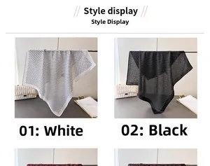 Detailed view of polka dot scarves in black and white styles hanging with modern accessories