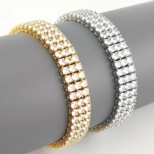 Bracciale tennis a tre file con zirconi cubici incastonati in finiture oro e argento
