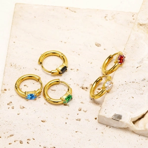 Detailed shot of gold-plated square zircon earrings in five vibrant gemstone colors