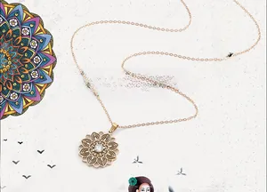 Detailed macro view of gold mandala flower pendant with hollow layers and center zircon