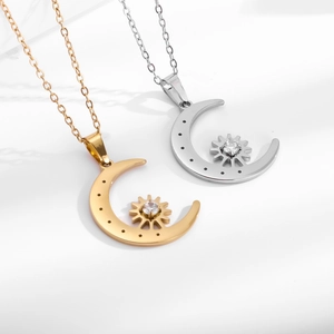 Star and moon necklace with crystal pendant in gold and silver stainless steel finish