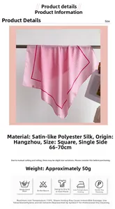 Detailed view of pink polka dot satin silk scarf with printed edges and material specs