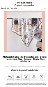 Detail of vintage clock print silk scarf showing satin texture and refined gear pattern