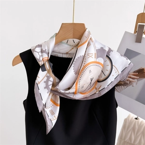 Elegant printed faux silk scarf with vintage mechanical clock patterns on a mannequin