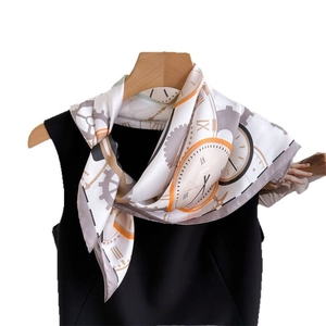 Ivory silk-like square scarf featuring vintage clock and gear prints on a wooden hanger