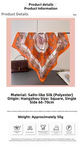 Detail view of square satin scarf featuring horse chain prints and washing instructions