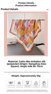 Detailed view of the silk-like satin square scarf with colorful handbag print patterns