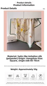 Detail of silk-like satin square scarf with yellow magnolia and bird prints