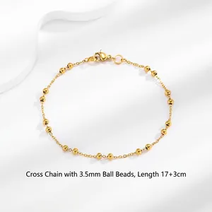 Detail of 18K gold-plated Rolo chain with 3.5mm beads and lobster clasp closure