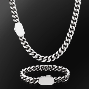 Polished stainless steel Cuban link chain set featuring a flat oval clasp detail