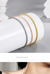 Detailed close-up of sparkling cauliflower chain bracelet in gold, silver and rose gold