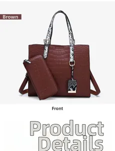 Détail du sac cabas marron à motif crocodile avec poignées en serpent et garnitures dorées