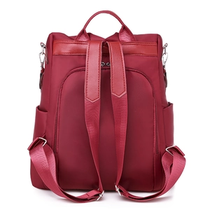 Waterproof burgundy embroidered backpack with anti-theft back pocket and side pouches