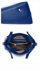 Detailansicht der Innenfächer und des blauen Lederimitats dieser Handtasche