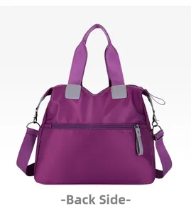 Detailed back view of a purple nylon tote bag featuring a hidden zipper pocket