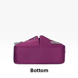 Detail view of the durable purple nylon handbag bottom with neat stitching and logo