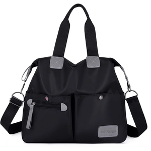 Black large capacity nylon tote bag with multiple pockets and adjustable shoulder strap