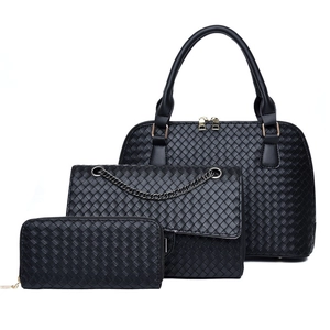 Three-piece black woven handbag set featuring tote, chain shoulder bag and long wallet