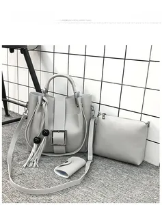 Dreiteiliges hellgraues Handtaschen-Set mit Eimertasche, Quasten und Schultergurt