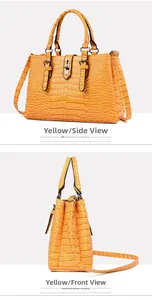 Détails du sac à main jaune à motif crocodile, texture cuir et boucle métallique