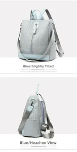Detail of light blue woven texture and vertical zipper on a stylish anti-theft backpack