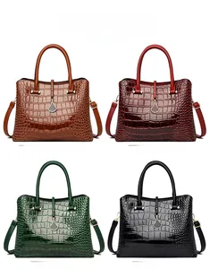 Collage of crocodile pattern handbags in yellow brown, wine red, green, and black