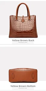 Rear and bottom view of tan tote bag with crocodile texture and glossy leather finish