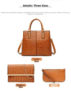 Dreiteiliges braunes Handtaschen-Set mit Kroko-Prägung bestehend aus Shopper und Etuis