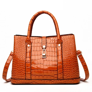 Glossy bright orange crocodile pattern handbag for women with golden metal lock