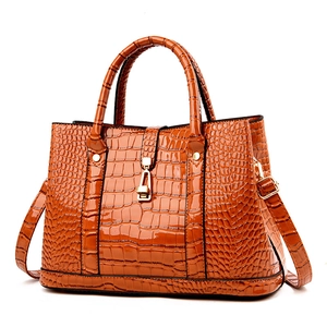 Three-piece set of crocodile pattern tote bag in caramel brown with gold metal lock closure
