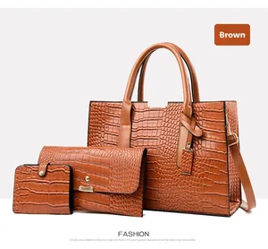 Detailed three-piece set featuring brown crocodile pattern tote bag and matching pouches