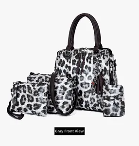 Detailansicht des 4-teiligen grauen Handtaschen-Sets mit Leopardenmuster und Geldbörsen