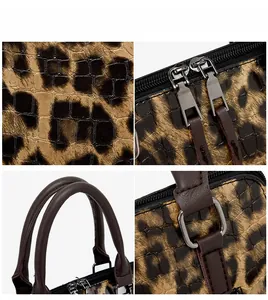 Detailansicht der Handtasche mit Leopardenmuster, Doppelreißverschluss und stabilen Griffen