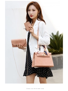 Three-piece beige croc-effect bag set featuring a scarf handle and metal turn-lock detail