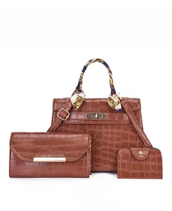 Three-piece brown faux crocodile handbag set with silk scarf and envelope pouch