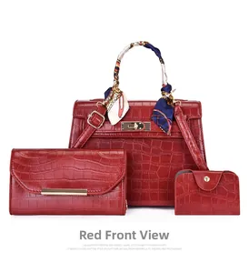 Three-piece red crocodile embossed handbag set with wallet and silk scarf detail