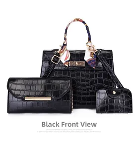 Three-piece black handbag set with embossed faux crocodile leather and floral scarf wrap