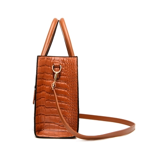 Three-piece brown crocodile pattern handbag set with adjustable crossbody strap
