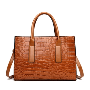 Brown crocodile pattern faux leather tote bag with dual handles and shoulder strap